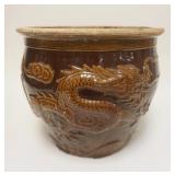 1274	ASIAN TERRACOTTA JARDINIERE W/ BROWN GLAZE & EMBOSSED DRAGON APP. 15 IN X 12 3/4 IN H. HAS A CH