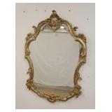 1323	ORNATE GILT MIRROR, APPROXIMATELY 29 IN X 44 IN
