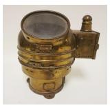 1056	BRASS SHIP COMPASS ENCLOSED IN CASE SIMILAR TO DIVING HELMET, APPROXIMATELY 11 IN HIGH