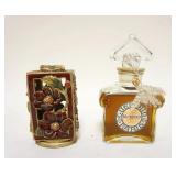 1067	FRENCH PERFUME BOTTLE GUERLAIN PARIS & ENAMELED BOTTLE HOLDER, TALLEST IS APPROXIMATELY 4 3/4 I