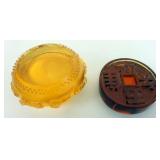 1173	2 PIECE LOT AMBER GLASS ASIAN STYLE PAPERWEIGHTS, LARGEST IS APPROXIMATELY 4 IN X 2 IN HIGH