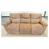 1207	LARGE FRAMED ARTWORK OF WOMAN  SEATED PHOTOING WITH MAN STANDING BEHIND HER WITH LEG ON CHAIR, 