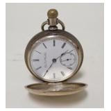 1299	ELGIN POCKET WATCH, WATCH CRYSTAL IS LOOSE, APPROXIMATELY 2 1/4 IN CASE