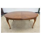 1321	OVAL WALNUT BANDED DINING TABLE WITH 2 LEAVES BY WHITE FURNITURE CO, APPROXIMATELY 79 IN X 46 I