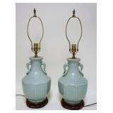 1018	PAIR OF CELADON TABLE LAMPS W/ELEPHANT HEADS & RINGS ON ORNATE WOOD BASES, APPROXIMATELY 27 IN 