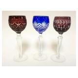 1019	LOT OF 3 ASSORTED COLORED CUT TO CLEAR WINE GLASSES, APPROXIMATELY 6 IN HIGH