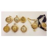 1078	LOT F 8 SMALL APPROXIMATELY 1 1/4 IN POCKET & WRISTWATCHES W/20 YEAR CASES, ALL AS FOUND
