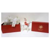 1166	CHRISTOPHER RADKO CHRISTMAS ORNAMENT, STERLING RIDER, APPROXIMATELY 9 1/2 IN HIGH