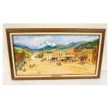 1216	OIL PAINTING ON BOARD TITLED *WESTERN TOWN* PANORAMIC VIEW OF A TOWN WITH COWBOYS AND HORSE DRA