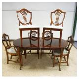 1256	MAHOGANY DINING TABLE AND 6 SHIELD BACK CHAIRS, TABLE APPROXIMATELY 64 IN X 42 IN X 29 IN