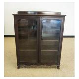 1268	MAHOGANY DOUBLE DOOR BOOKCASE, APPROXIMATELY 43 IN X 13 IN X 54 IN H