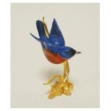 1018	BOHEM MINIATURE BLUE BIRD ON GILT METAL BRANCH, APPROXIMATELY 3 IN H