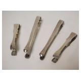 1028	4 MINIATURE STERLING TONGS INCLUDING TIFFANY & CO. AND TOWLES, .62 TOZ, LARGEST IS APPROXIMATEL