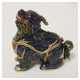 1035	ENAMELED FOO DOG HINGED BOX WITH PEARL IN FOO DOG MOUTH AND JEWELLED EYES, APPROXIMATELY 2 1/2 