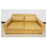 1249	DESIGN WITHIN REACH AMERICAN LEATHER LOVE SEAT, SCRATCHES TO TOP, BACK AND SIDES, APPROXIMATELY