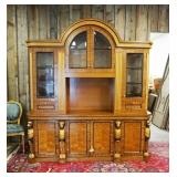 1260	NEO CLASSIC 2 PART BREAKFRONT WITH REEDED COLUMN TOP AND CARVED GILT LIONS ON BASE, BEVELED GLA