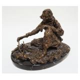 1032	BRONZE SCULPTURE OF MAN CROUCHED, BULLDOG & A FIRE ON MARLBE SLAG, ARTIST SIGNED, APPROXIMATELY