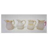1042	BELLEEK IRISH CHINA, LOT OF 4 PITCHERS, GREEN, BROWN & BLACK MARK, LARGEST IS APPROXIMATELY 4 I