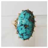 1165	10K YELLOW GOLD RING W/ ONE OVAL CABOCHON CUT TURQUOISE. 3.75 DWT INCLUDING STONES