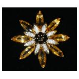 1176	14K YELLOW GOLD FLORAL BROOCH PIN CONTAINING EIGHT MARQUISE CUT CITRINES SEVEN ROUND CUT SMOKEY