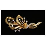 1186	14K YELLOW GOLD BROOCH PIN CONTAINING APP. 0.15 CARATS OF DIAMONDS. OVERALL WEIGHT 6.15 DWT. AP