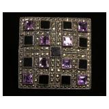 1193	STERLING SILVER BROOCH W/PURPLE & BLACK STONES, SIGNED JUDITH JACK, APPROXIMATELY 1 3/4 IN SQUA