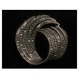 1194	STERLING SILVER & MARCASITE SWIRL BROOCH, APPROXIMATELY 1 3/4 IN DIAMETER