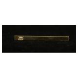 1204	14KT YELLOW GOLD BAR BROOCH W/ONE DIAMOND APPROXIMTELY 0.03 CARATS