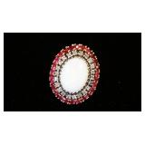 1229	BEAUTIFUL 12KT YELLOW GOLD RING W/OVAL WHITE OPAL CENTER STONE & RUBIES, 10.9 DWT W/STONES, RIN