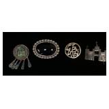 1233	4 STERLING SILVER BROOCHES/PINS INCLUDING ONE W/BLACK ONYX STONE APPROXIMATELY 2 1/4 IN WIDE