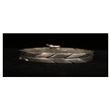 1244	STERLING SILVER BRACELET MARKED MEXICO, APPROXIMATELY 8 1/4 IN LONG, 1.723 OZT