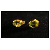 1297	PAIR OF 14K YELLOW GOLD PIERCED EARRINGS CONTAINING EMERALDS, 0.5 DWT INCLUDING STONES