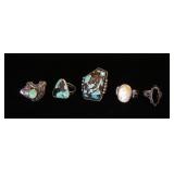 1309	5 STERLING RINGS CONTAINING TURQUOISE, MOTHER OF PEARL, BLACK ONYX, ETC, 1.511 OZT INCLUDING ST