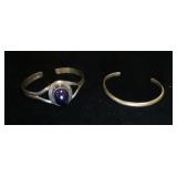 1313	2 STERLING SILVER CUFF BRACELETS INCLUDES ONE CONTAINING AMETHYST & ONE MARKED HAND MADE, 1.051