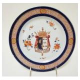 1043	ANTIQUE HAND PAINTED PLATE W/COAT OF ARMS, CHARACTER SIGNED ON BACK, APPROXIMATELY 9 1/2 IN