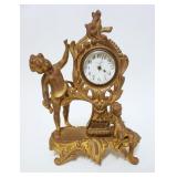 1065	NEW HAVEN CAST METAL FIGURAL CLOCK, APPROXIMATEL 9 IN HIGH