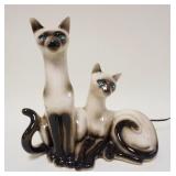 1081	SIAMESE CAT CERAMIC LIGHT W/BLUE JEWELRY LIKE EYES, APPROXIMATELY 12 1/4 IN HIGH