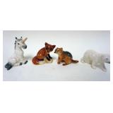 1140	GOEBEL ANIMAL  FIGURINES, LOT OF 4 INCLUDING UNICORN, FOX,AND BEAR. TALLEST APPROXIMATELY 4  IN