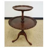 1220	MAHOGANY 2 TIER TABLE WITH PIERCED EDGES, APPROXIMATELY 24 IN X 33 IN H 