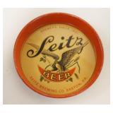 1102	ANTIQUE SEITZ BEER TIN TIP TRAY APPROXIMATELY 4 1/4 IN