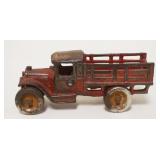 1112	ANTIQUE CAST IRON TOY TRUCK, APPROXIMATELY 5 IN X 1 1/2 IN X 2 IN