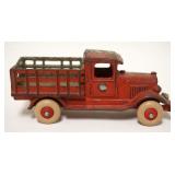 1124	ANTIQUE CAST IRON TOY STAVE BODY TRUCK, APPROXIMATELY 2 1/4 IN X 7 IN X 3 IN HIGH
