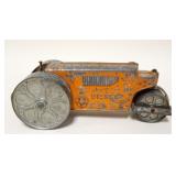 1137	ANTIQUE CAST METAL HUBLEY TOY TRACTOR, APPROXIMATELY 4 IN X 10 IN X 4 IN HIGH