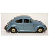 1145	TIN TOY FRICTION VOLKSWAGON BEETLE BUG JAPAN CAR, APPROXIMATELY 3 IN X 8 IN X 3 IN HIGH