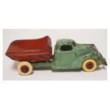 1167	ANTIQUE CAST IRON TOY DUMP TRUCK, APPROXIMATELY 1/2 IN X 6 IN X 2 IN HIGH