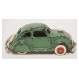 1175	ANTIQUE CAST IRON TOY CAR, APPROXIMATELY 4 1/4 IN LONG X 1 3/4 IN HIGH