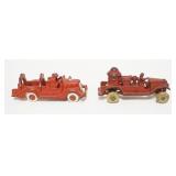 1180	2 ANTIQUE CAST IRON TOY FIRE TRUCKS, ONE HUBLEY, LARGEST APPROXIMATELY 5 IN X 2 IN