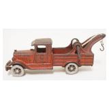 1181	ANTIQUE CAST IRON TOW TRUCK, APPROXIMATELY 9 IN LONG X 3 3/4 IN HIGH