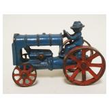 1183	ANTIQUE CAST IRON TOY TRACTOR, APPROXIMATELY 4 IN X 3 IN HIGH