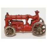 1188	ANTIQUE CAST IRON TOY TRACTOR, APPROXIMATELY 4 IN X 2 1/2